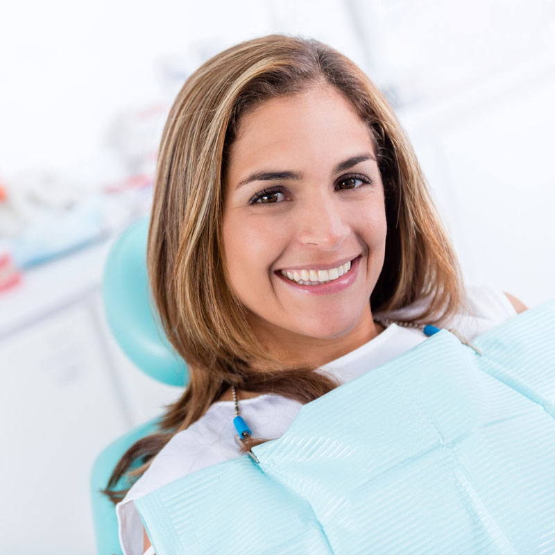 lady in dental chair smiling